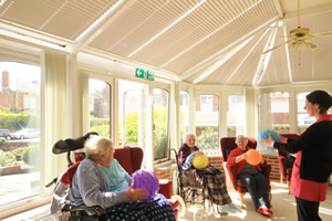 Home of Comfort - Activity session in the conservatory
